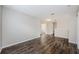 Living room with hardwood floors that lead to various rooms including bedrooms and bathrooms at 1712 Crossvine Ct, Trinity, FL 34655