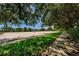 Community recreation area featuring a soccer field, basketball court, and playground at 1712 Crossvine Ct, Trinity, FL 34655