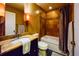 Bathroom with tile shower/tub combo, vanity sink with granite countertop at 1955 Cobblestone Way, Clearwater, FL 33760