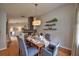 Elegant dining room featuring hardwood floors and contemporary decor, creating a cozy ambiance for gatherings at 1955 Cobblestone Way, Clearwater, FL 33760