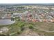 Community aerial view showcases houses, lakes, and green spaces at 1972 Wolf Laurel Dr, Sun City Center, FL 33573