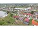 An aerial view highlighting community homes, ponds, and scenic landscaping at 1972 Wolf Laurel Dr, Sun City Center, FL 33573