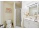 This bathroom provides a well-lit vanity, a shower, and simple décor, perfect for everyday use at 1972 Wolf Laurel Dr, Sun City Center, FL 33573