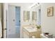 This bathroom showcases a vanity and a view into an adjacent room at 1972 Wolf Laurel Dr, Sun City Center, FL 33573