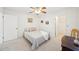 Comfortable bedroom featuring soft lighting, closet, and neutral colors for a peaceful and relaxing atmosphere at 1972 Wolf Laurel Dr, Sun City Center, FL 33573