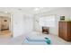 Inviting bedroom featuring ample closet space, soft carpet, and natural light for comfortable living at 1972 Wolf Laurel Dr, Sun City Center, FL 33573