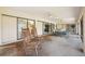 Cozy lanai with comfortable seating, perfect for enjoying the outdoors at 1972 Wolf Laurel Dr, Sun City Center, FL 33573