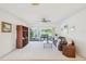 Bright living room with a view of the patio at 1972 Wolf Laurel Dr, Sun City Center, FL 33573
