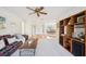 Open living space with stylish decor, leading to the dining area at 1972 Wolf Laurel Dr, Sun City Center, FL 33573