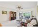 Sun-filled living room with sliders to the screened lanai at 1972 Wolf Laurel Dr, Sun City Center, FL 33573