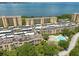 Aerial view of condos with beautiful water views and a swimming pool at 2617 Cove Cay Dr # 206, Clearwater, FL 33760