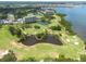 Lush golf course community with condos, ponds, and beautifully maintained landscaping from above at 2617 Cove Cay Dr # 206, Clearwater, FL 33760