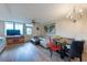Open-concept living room with stylish furnishings, ample natural light, and wood-look floors at 2617 Cove Cay Dr # 206, Clearwater, FL 33760