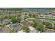 An aerial view showcasing the property's location within a vibrant community, complete with picturesque lakes and recreational facilities at 2637 Yukon Cliff Dr, Ruskin, FL 33570