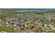 Gorgeous aerial view of homes in a lakeside community, centered on a home at 2637 Yukon Cliff Dr, Ruskin, FL 33570
