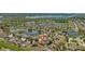 Beautiful aerial view of homes in a lakeside community, centered on a home marked with a pin drop at 2637 Yukon Cliff Dr, Ruskin, FL 33570