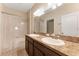 Bathroom with dual sinks, granite countertops and a shower/tub combo at 2637 Yukon Cliff Dr, Ruskin, FL 33570