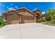 Charming single-story home with a well-manicured lawn, a spacious driveway, and a two-car garage at 2637 Yukon Cliff Dr, Ruskin, FL 33570