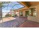 Screened-in patio with brick pavers and ample sunlight at 2637 Yukon Cliff Dr, Ruskin, FL 33570
