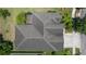Aerial view of the roof showing coverage and a screened in lanai off the rear of the property at 2637 Yukon Cliff Dr, Ruskin, FL 33570