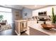 Modern kitchen featuring stone countertops, stainless steel appliances, and an open design at 2643 St Josephs W Dr, Dunedin, FL 34698