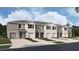 New townhome with neutral exterior, landscaping, and single-car garage at 31326 Ancient Sage Rd, Wesley Chapel, FL 33545