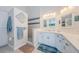 Bathroom features modern cabinetry, quartz countertops, dual sinks, and walk-in shower at 3174 Eagles Landing W Cir # 58, Clearwater, FL 33761