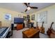 This bonus room offers space for entertainment with instruments and plenty of space to relax at 3174 Eagles Landing W Cir # 58, Clearwater, FL 33761