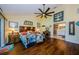 Spacious main bedroom boasts wood floors and en suite bath at 3174 Eagles Landing W Cir # 58, Clearwater, FL 33761