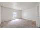 Well-lit bedroom with plush carpet and a large window for natural light at 3505 Tarpon Woods Blvd # N405, Palm Harbor, FL 34685