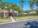 Charming community with a clubhouse, pool, and lush landscaping at 3505 Tarpon Woods Blvd # N405, Palm Harbor, FL 34685