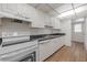 Well-maintained kitchen with white appliances and ample cabinet space at 3505 Tarpon Woods Blvd # N405, Palm Harbor, FL 34685
