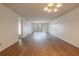 A view of the spacious living room with sliding glass doors to the lanai at 3505 Tarpon Woods Blvd # N405, Palm Harbor, FL 34685
