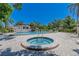 Relaxing community pool area with a separate hot tub and plenty of seating for residents at 3505 Tarpon Woods Blvd # N405, Palm Harbor, FL 34685