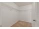 Walk-in closet with wire shelving and carpeted floor at 3505 Tarpon Woods Blvd # N405, Palm Harbor, FL 34685