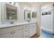 Bright bathroom with double vanity, modern fixtures, and separate toilet/shower room at 3604 Arlington Oaks Ct, Tampa, FL 33618