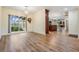 Dining room with a light fixture, hardwood floors and a view of the outdoor at 3604 Arlington Oaks Ct, Tampa, FL 33618