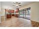 Bright kitchen with stainless steel appliances, granite countertops, and sliding doors to the pool at 3604 Arlington Oaks Ct, Tampa, FL 33618