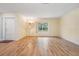 Open living room with wood floors and plenty of natural light at 3604 Arlington Oaks Ct, Tampa, FL 33618