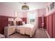 Stylish bedroom with a comfortable bed, soft lighting, and elegant decor at 37255 Sagemoor Dr, Zephyrhills, FL 33541