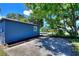 Spacious backyard with a lush green landscape, mature trees, and plenty of room for outdoor activities at 3763 Darthmouth N Ave, St Petersburg, FL 33713