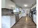 Beautiful kitchen with white cabinets, granite countertops, and stainless steel appliances at 3763 Darthmouth N Ave, St Petersburg, FL 33713