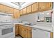 Efficient kitchen with a view through to the living and dining areas at 39650 Us Highway 19 N # 553, Tarpon Springs, FL 34689