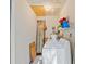 Laundry room with a washer, dryer, and shelving for storage at 39650 Us Highway 19 N # 553, Tarpon Springs, FL 34689