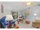 Comfortable living room with sliding glass doors to the patio at 39650 Us Highway 19 N # 553, Tarpon Springs, FL 34689