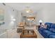 Open concept living area, adjoining dining area, with open flow and bright natural light at 39650 Us Highway 19 N # 553, Tarpon Springs, FL 34689