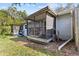 Exterior view of a screened porch attached to the property at 39650 Us Highway 19 N # 553, Tarpon Springs, FL 34689