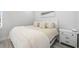 Serene bedroom featuring natural light, complemented by a cozy bed and stylish nightstand at 4120 W North A St # 2, Tampa, FL 33609