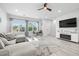 Cozy living room with hardwood floors, a comfortable sofa, and an entertainment center at 4120 W North A St # 2, Tampa, FL 33609