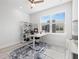 A bright office featuring a desk, bookcase, and a large window offering ample natural light at 4120 W North A St # 2, Tampa, FL 33609